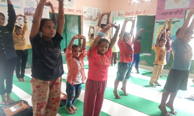 Students practiced yoga in Agra